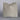 Gray pillow on a light gray background
