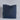 Navy blue pillow on a white background